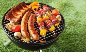 Yummy food cooking on a open flame charcoal grill Yummy food cooking on a open flame charcoal grill