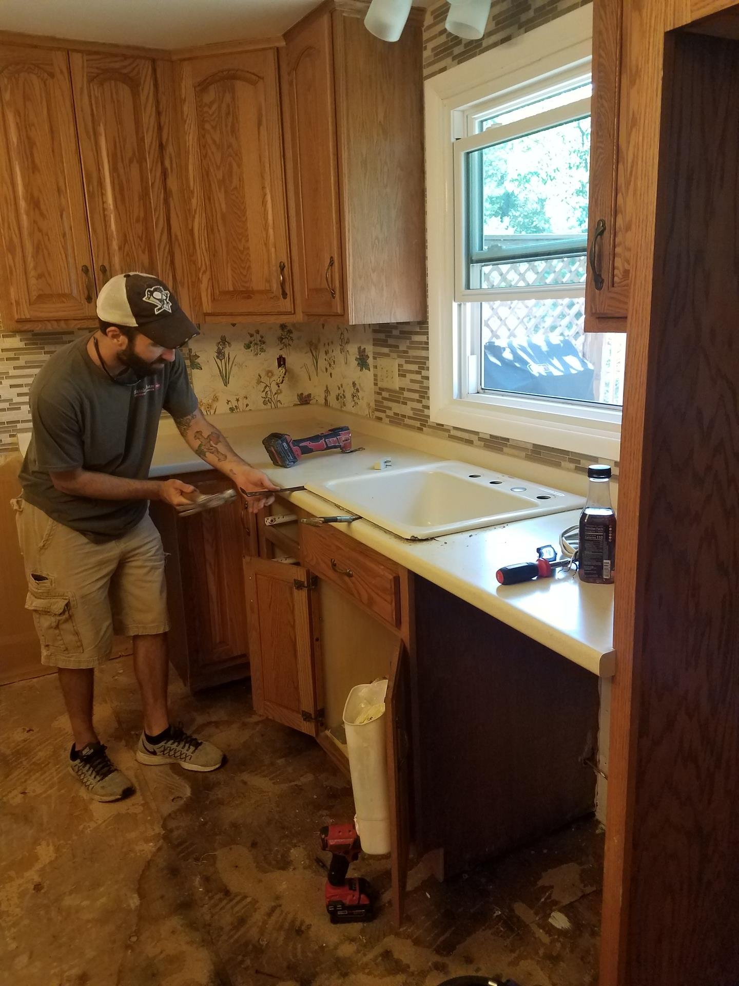 Repairing sink leak