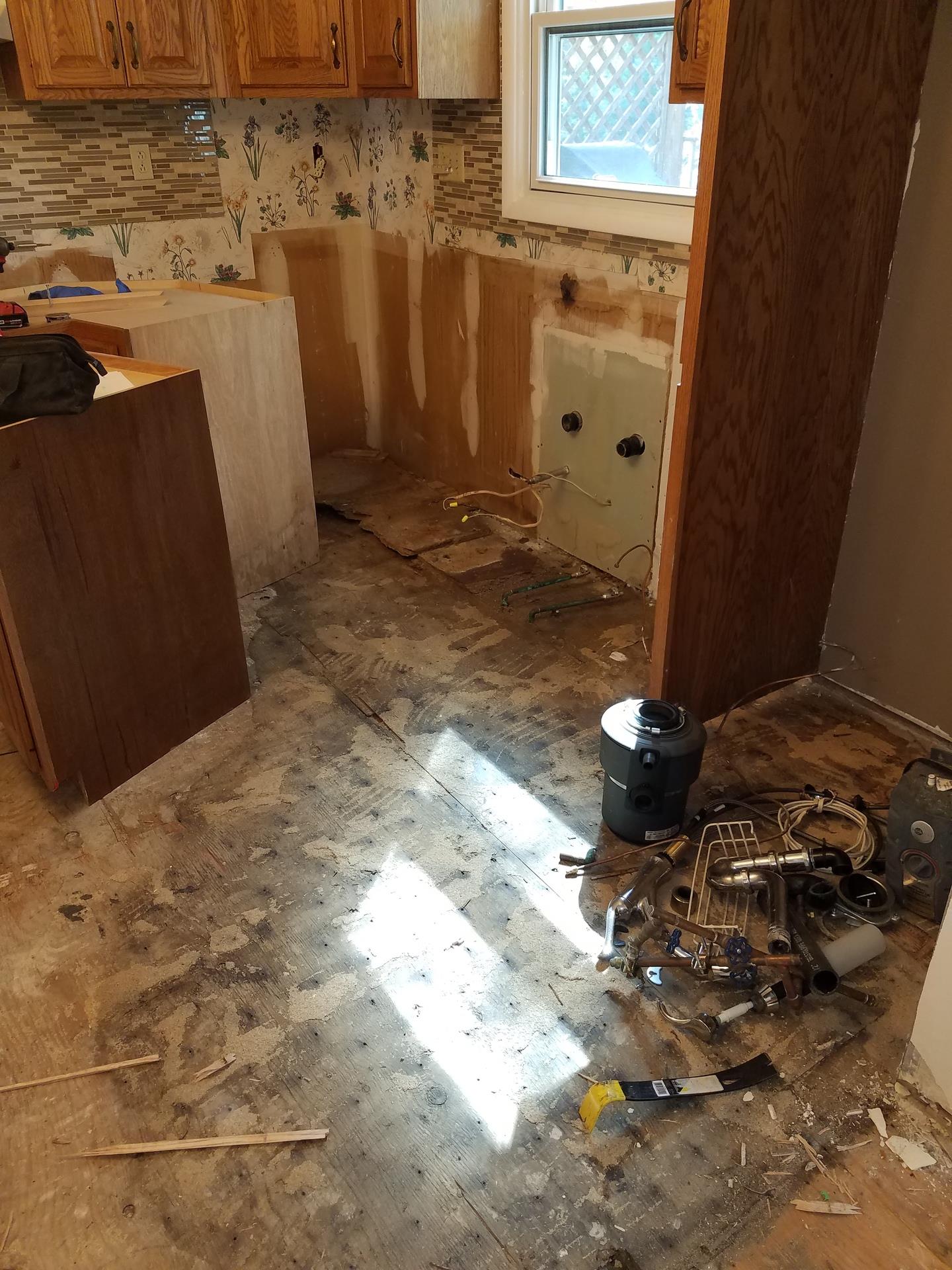 Shot of kitchen being repaired