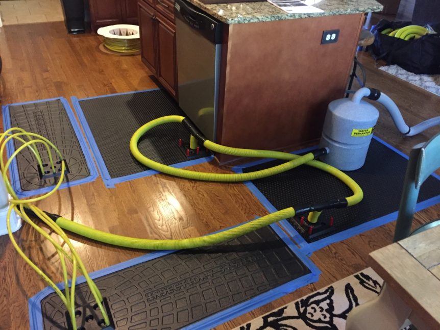 How to Save Water Damaged Hardwood Floors STOP Restoration Winston Salem