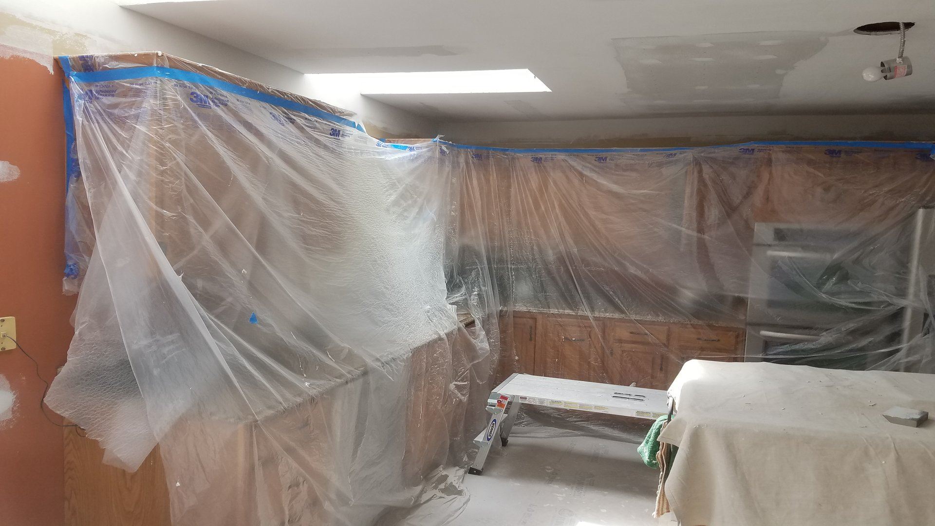 Cabinets covered in protective covering