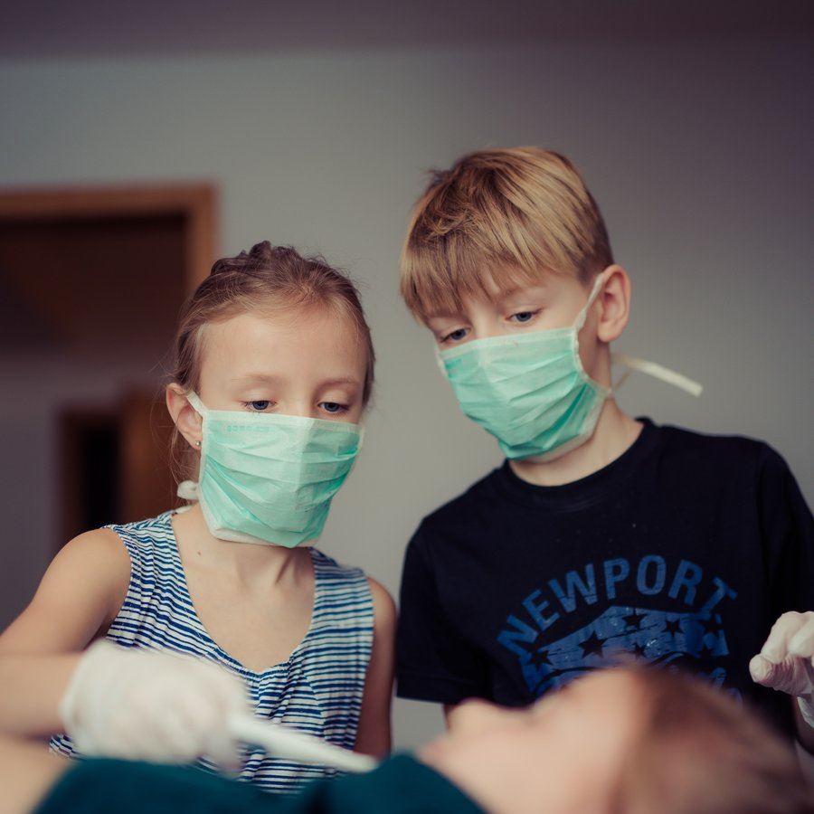 Two Children wearing face masks Two Children wearing face masks