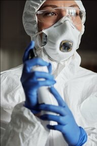 Person Wearing Protective Gear Covering Face & Body